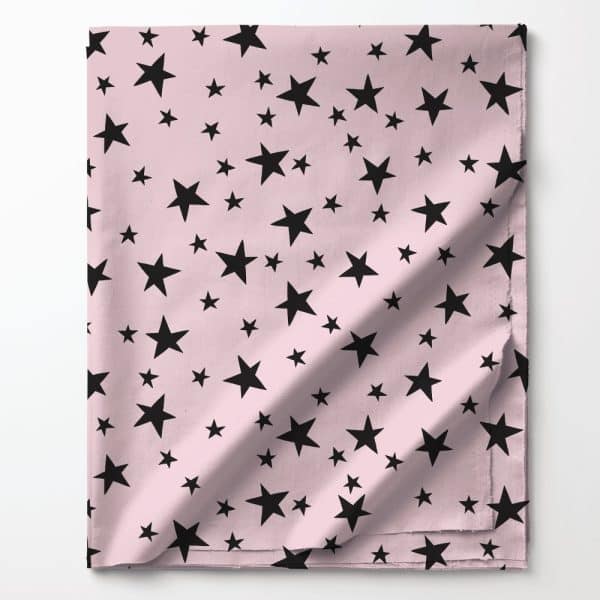 Pink Fabric With A Repeating Pattern Of Black Stars.