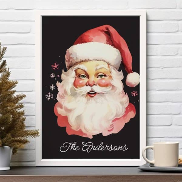 Framed Watercolor Painting Of Santa Claus'S Face, With The Name Andersons Below.