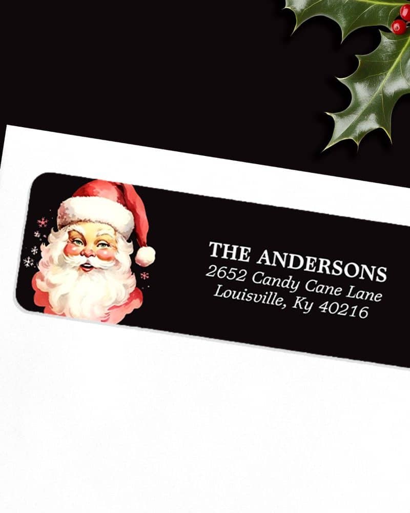 Black return address label with a vintage Santa Claus illustration and the Andersons family name and address.