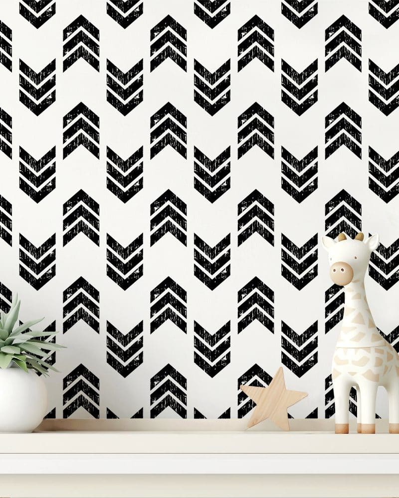 Black and white chevron pattern wallpaper featuring a textured arrow design.