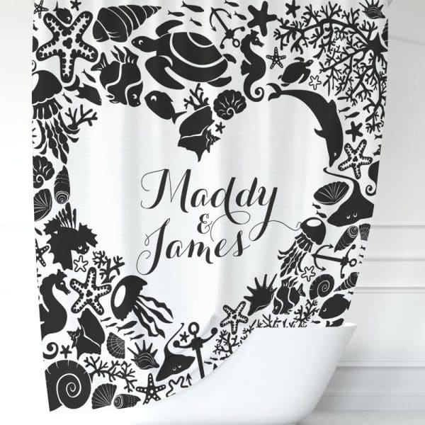 A White Shower Curtain With A Black Heart-Shaped Border Of Sea Creatures And The Names Maddy &Amp; James In The Center.