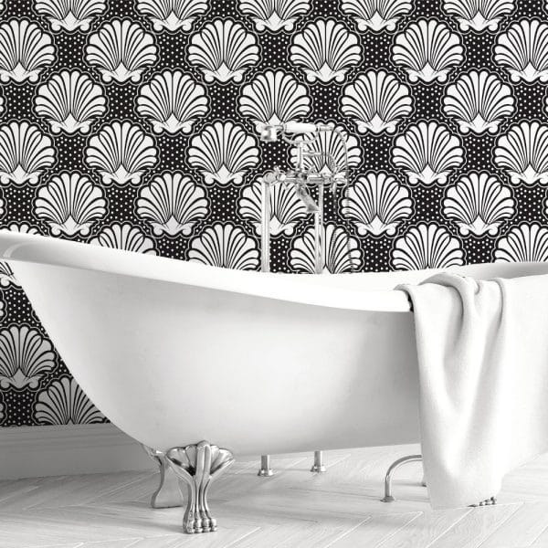 White Clawfoot Bathtub In Front Of A Black And White Shell Patterned Wall.