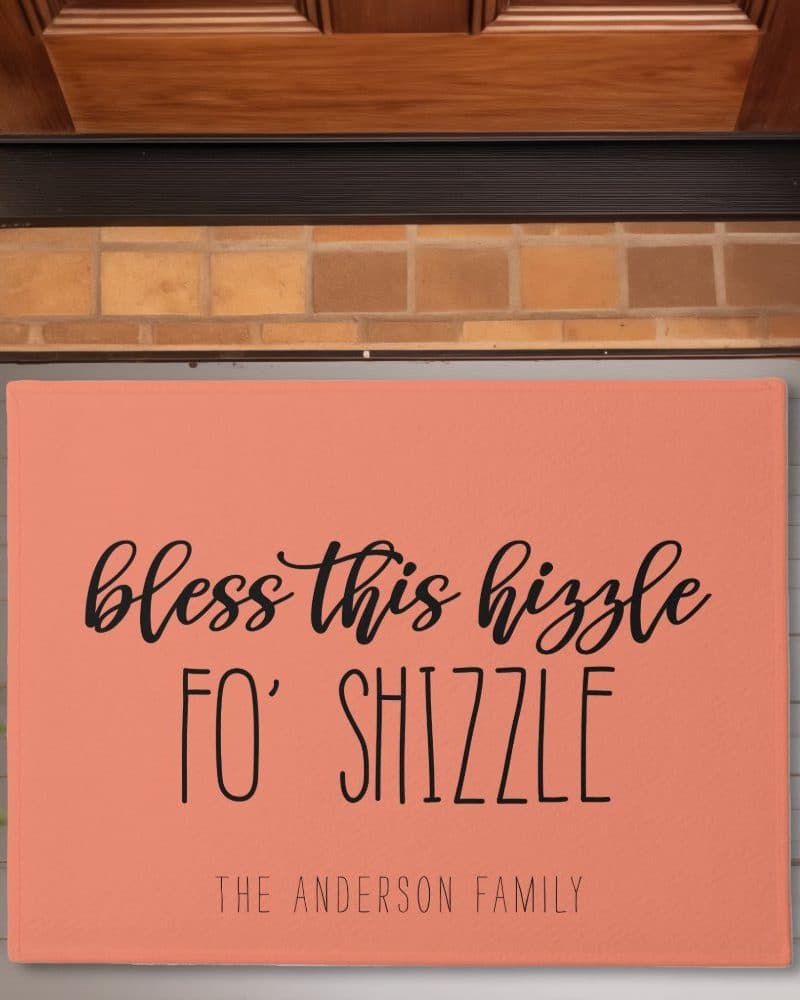 Coral doormat with the text Bless this hizzzle fo' shizzle and The Anderson Family.
