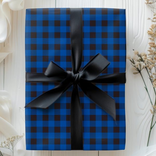 Blue And Black Checkered Gift Box With A Black Ribbon Bow.