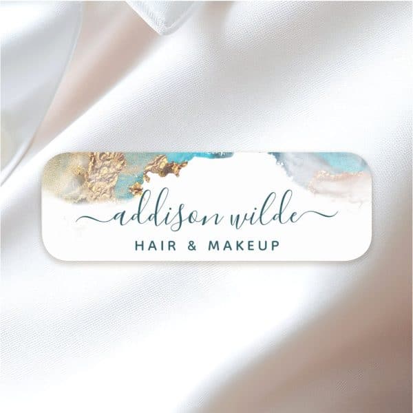 Addison Wilde Hair And Makeup Logo With Teal And Gold Abstract Design.