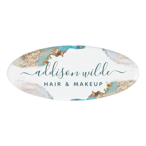 Oval Logo For Addison Wilde Hair &Amp; Makeup. The Logo Features Teal And Gold Watercolor-Style Design.