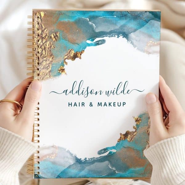 Spiral-Bound Notebook With Teal And Gold Abstract Design, Displaying Addison Wilde Hair &Amp; Makeup.