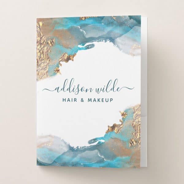 A Pocket Folder Featuring Teal And Gold Abstract Watercolor Design And The Text Addison Wilde Hair &Amp; Makeup.