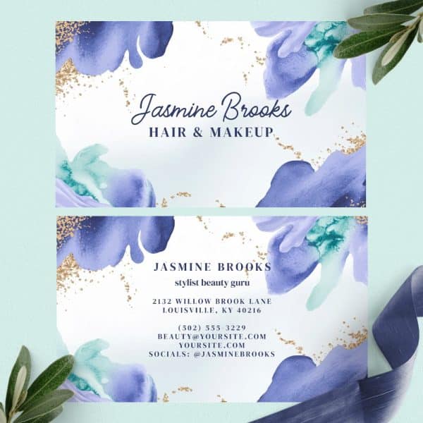 Two Business Cards For Jasmine Brooks, Hair And Makeup Stylist, Featuring Purple And Teal Watercolor Designs And Gold Accents.