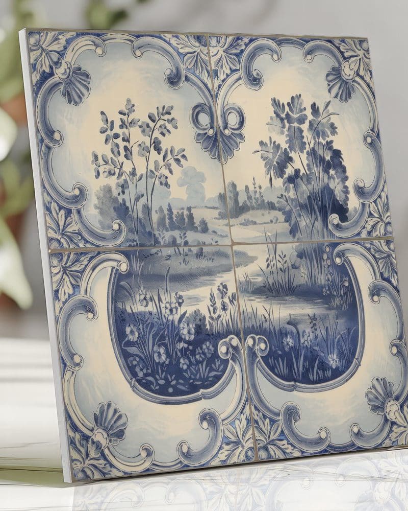 Blue and white tile depicting a pastoral landscape.