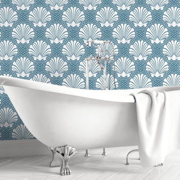 White Clawfoot Bathtub In Front Of A Teal Seashell Patterned Wall.