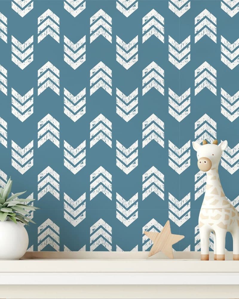 White chevron arrows on a teal background.