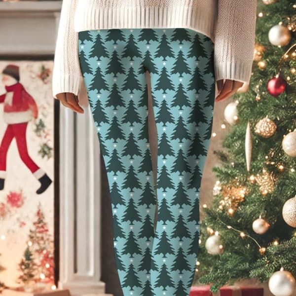 Teal Leggings With A Repeating Pattern Of Dark Green Christmas Trees And Small White Stars.