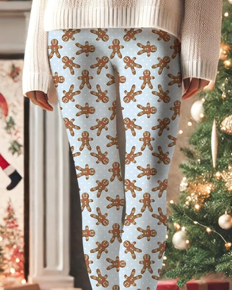 Light blue leggings with a repeating pattern of gingerbread men.