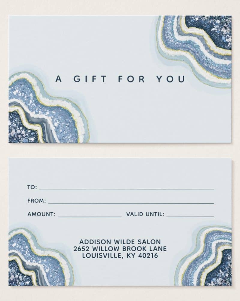A light blue gift certificate with agate design features a section for recipient and giver information, amount, and validity date. The salon's name and address are printed at the bottom.