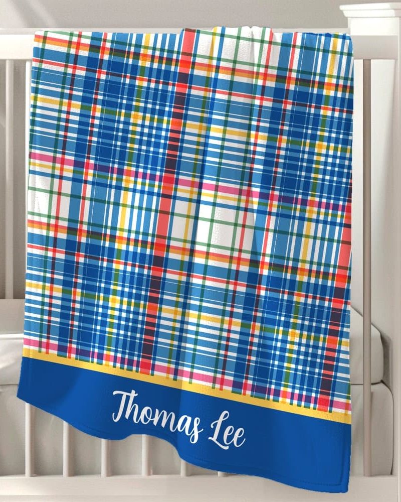 Personalized blue plaid baby blanket with the name Thomas Lee.
