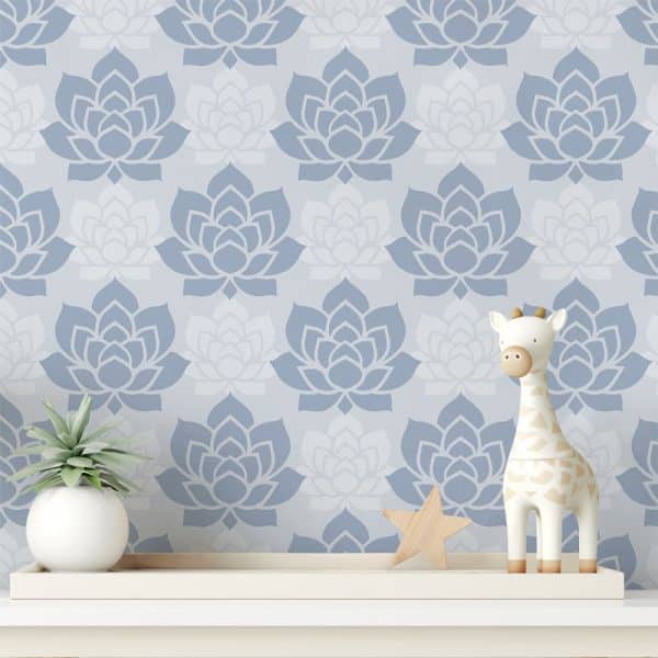 A Shelf With A Small Potted Plant, Wooden Star, And A Giraffe Toy In Front Of A Wall Covered In A Blue And White Floral Pattern.