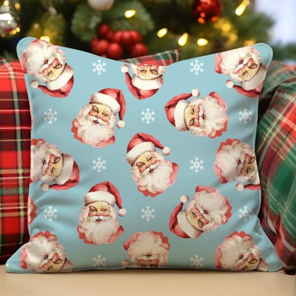 Light Blue Throw Pillow With A Repeating Pattern Of Vintage Santa Claus Illustrations And Snowflakes.