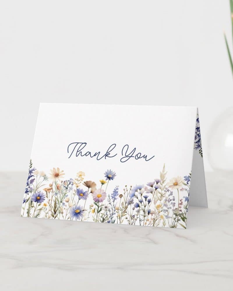 Thank you card with a watercolor floral border.
