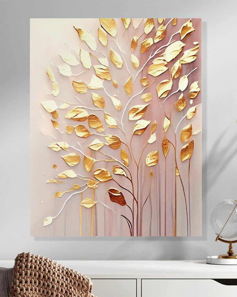 Abstract painting of a tree with gold leaves on a blush pink background.