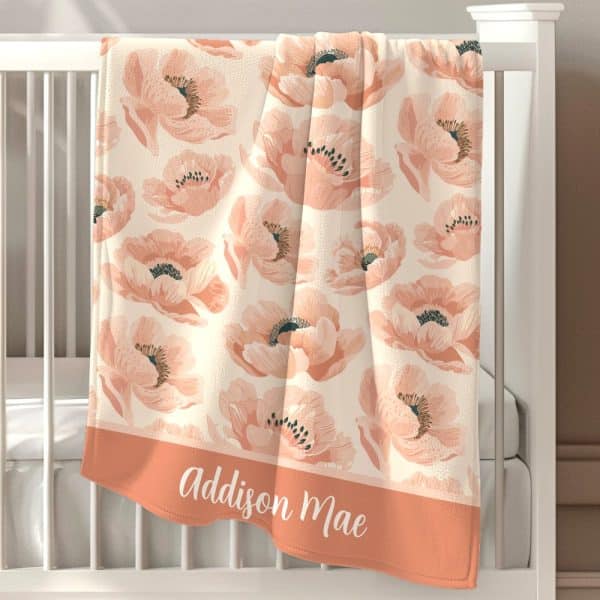Personalized Peach Floral Baby Blanket With The Name Addison Mae.