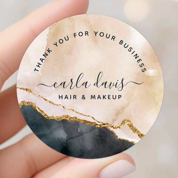 Round Thank You Sticker With A Watercolor Design In Beige, Black, And Gold, Featuring The Name Carla Davis Hair &Amp; Makeup.