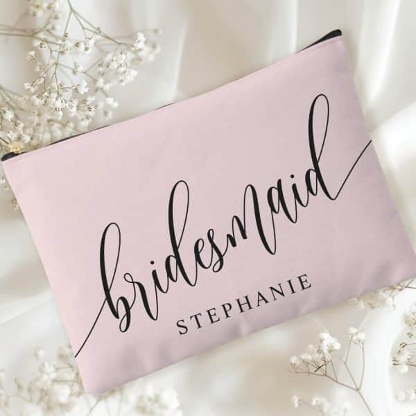Pink Bridesmaid Makeup Bag With The Name Stephanie.