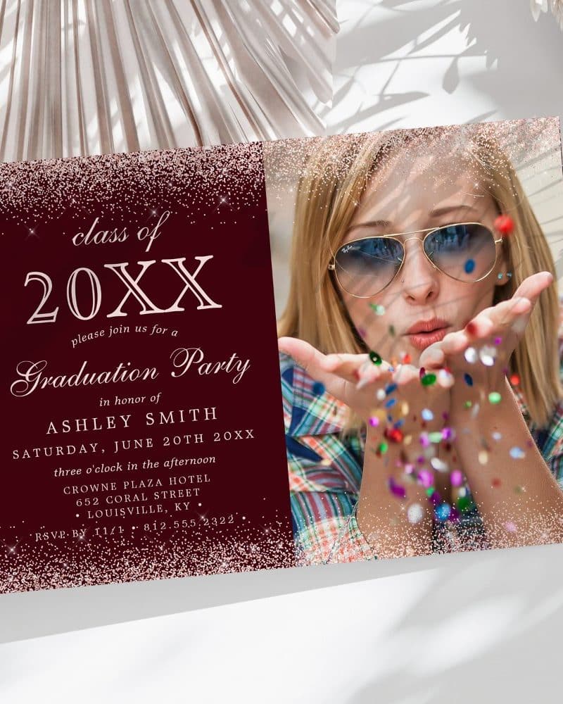 Graduation party invitation for Ashley Smith, class of 20XX, featuring a photo of her blowing confetti.