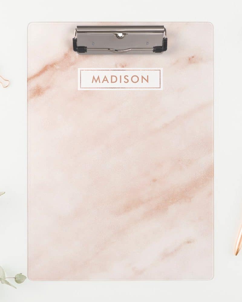 Rose gold clipboard with the name Madison on it.