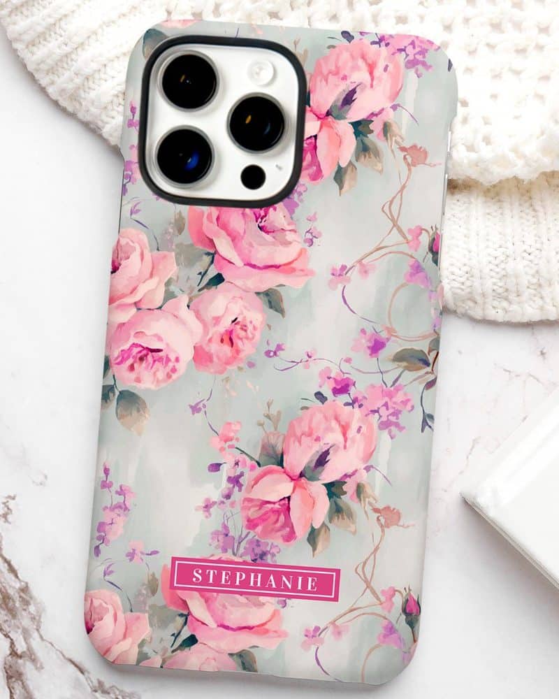 Phone case with a watercolor floral design featuring pink roses and purple accents, personalized with the name Stephanie.