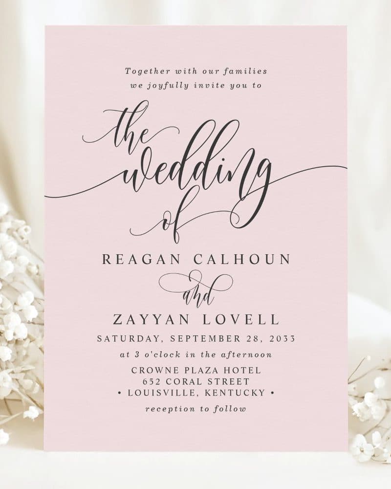 Pink wedding invitation for Reagan Calhoun and Zayyan Lovell.