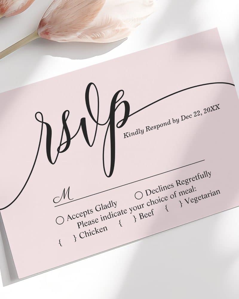 A light pink RSVP card with elegant black script lettering.