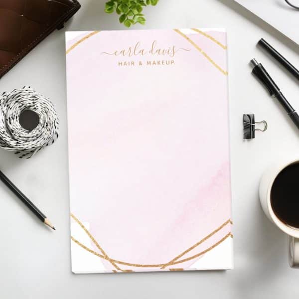 Pink Notepad With Gold Geometric Design And Carla Davis Hair &Amp; Makeup Branding.