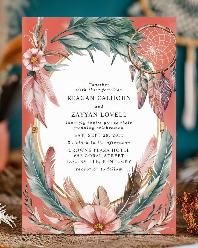 Wedding invitation with peach background, floral design, and dreamcatcher. The names Reagan Calhoun and Zayyan Lovell are prominently featured.