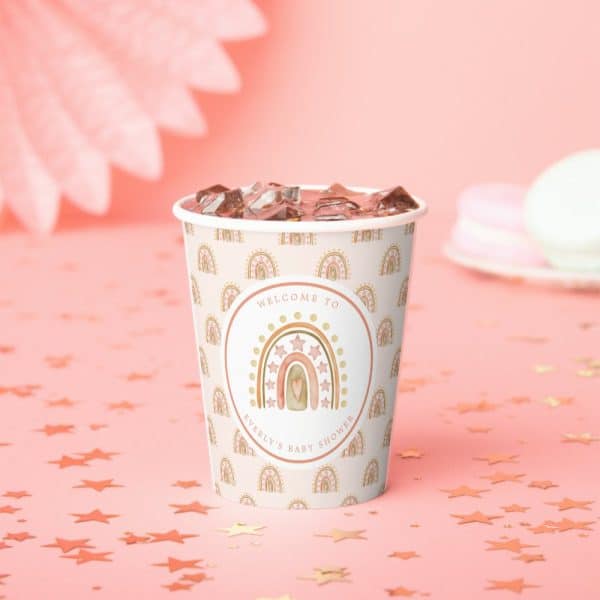 A Paper Cup With Ice, Decorated With A Pastel Rainbow And Stars Design For A Baby Shower.