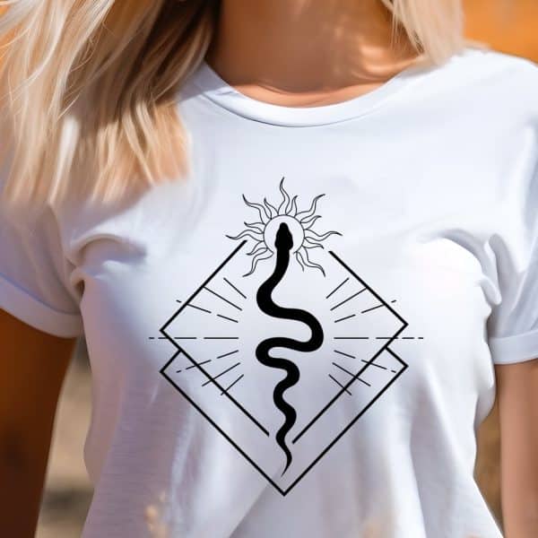 A Woman Wearing A White T-Shirt With A Graphic Design Of A Snake Rising From A Sun Within A Geometric Shape.
