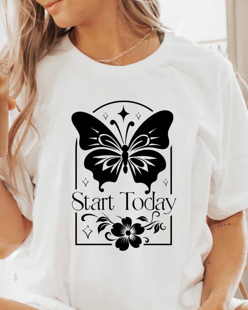 White t-shirt with a black butterfly design, a flower, and the words Start Today.