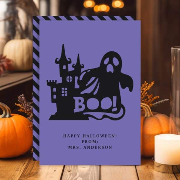 Purple Halloween Card With A Black Ghost And Haunted House Illustration, Text Reading Boo!, And A Happy Halloween Greeting From Mrs. Anderson.