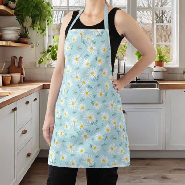 A Light Blue Apron With A Daisy Print.