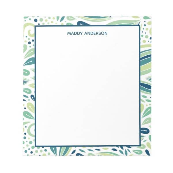 Personalized Notepad With A Teal And Green Leaf Pattern Border.