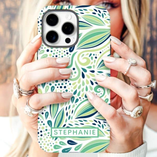 A Woman'S Hands Hold A Phone Case With A Green And White Floral Design And The Name Stephanie.