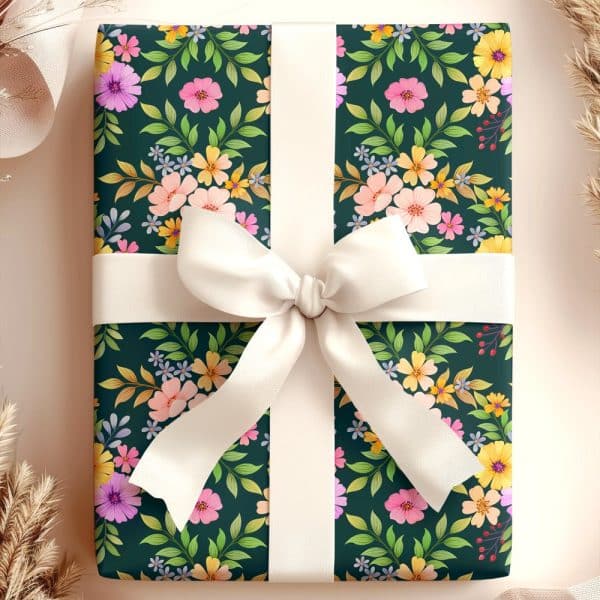 A Gift Box With A Floral Pattern And A Cream-Colored Ribbon.