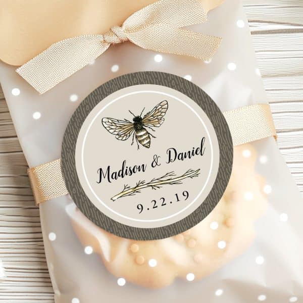 Wedding Favor Bag With A Round Label Featuring A Bee Illustration, The Couple'S Names Madison &Amp; Daniel, And The Date 9.22.19.