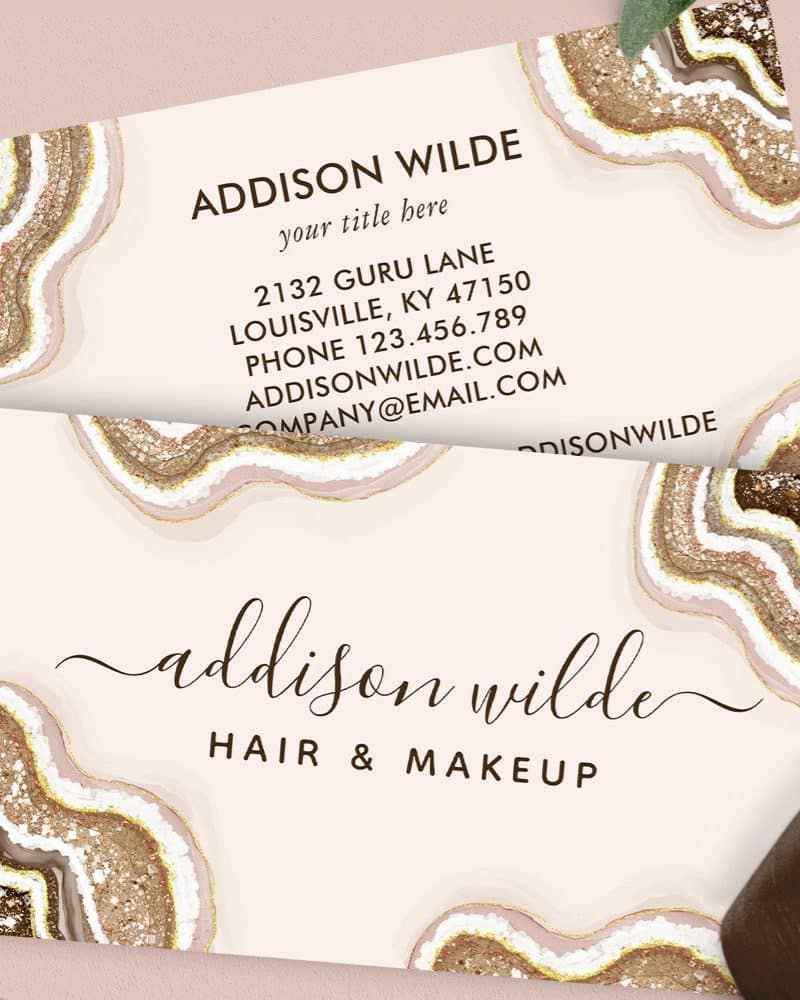 Business card for Addison Wilde, hair and makeup artist, featuring an agate design.