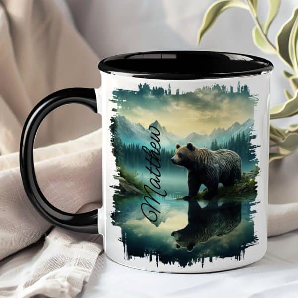 A Black-Handled Mug With A Personalized Name, Matthew, And A Grizzly Bear Reflected In A Mountain Lake.