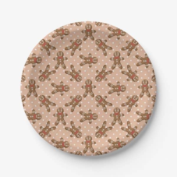Paper Plate With A Repeating Pattern Of Gingerbread Men On A Light Brown Background With White Polka Dots.