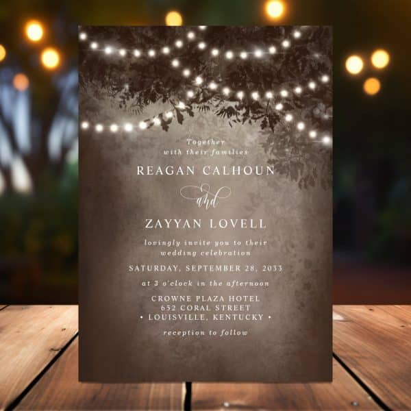 Wedding Invitation For Reagan Calhoun And Zayyan Lovell, Featuring String Lights And Foliage.