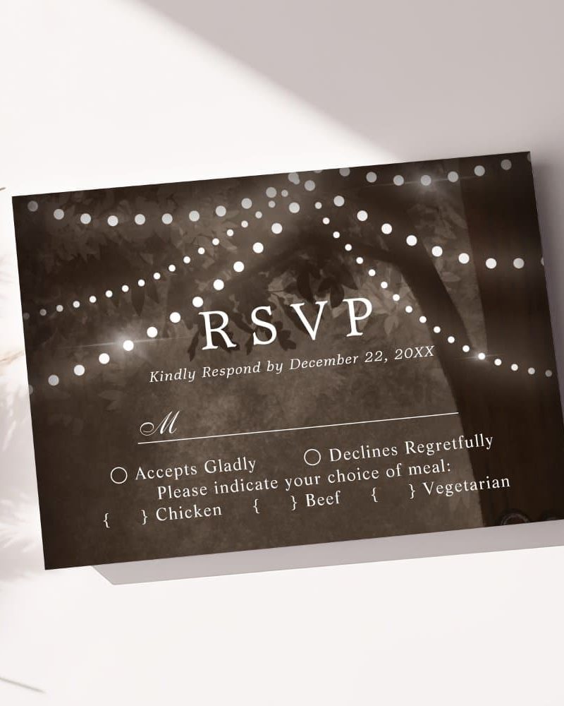 Sepia-toned RSVP card with string lights and tree silhouette; indicates acceptance or regrets by a certain date, and meal choices.