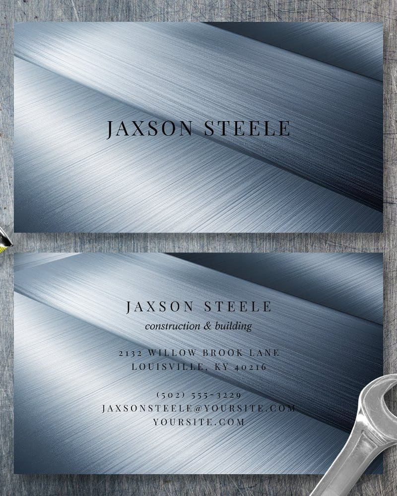 Two business cards for Jaxson Steele, construction and building, on a brushed metal background.
