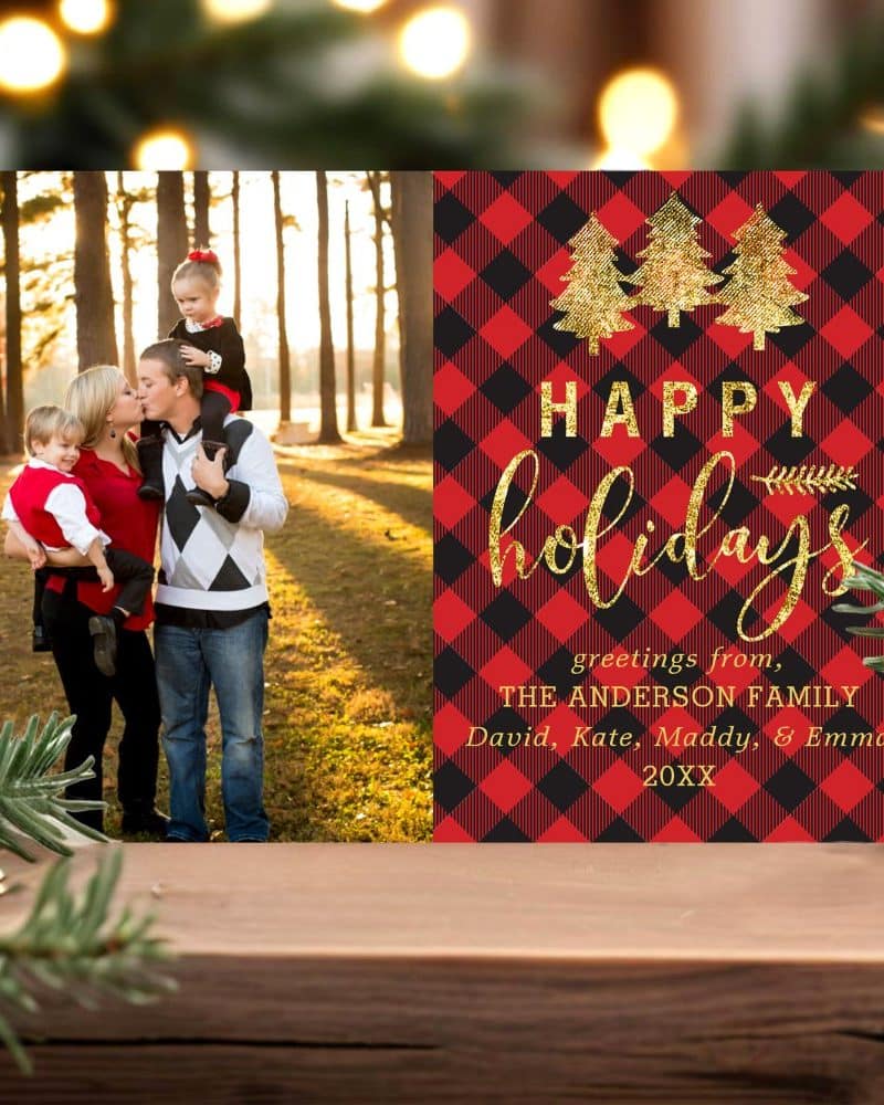 Christmas holiday card featuring a family photo with a red and black plaid background.